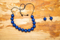 Load image into Gallery viewer, Blue, Red and Green Tagua Nut Adjustable Necklace and Earrings set (Click to see other colors)