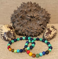 Load image into Gallery viewer, Handmade Tagua Nut & 7 Chakra Healing Bracelet Set (Pair)
