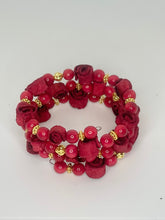 Load image into Gallery viewer, Red Tagua Bracelet with Orange Peel Flowers
