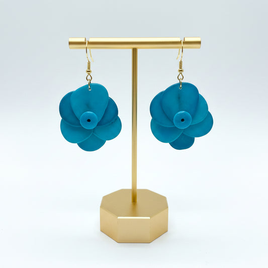 turquoise flower-shaped tagua nut spring earrings 