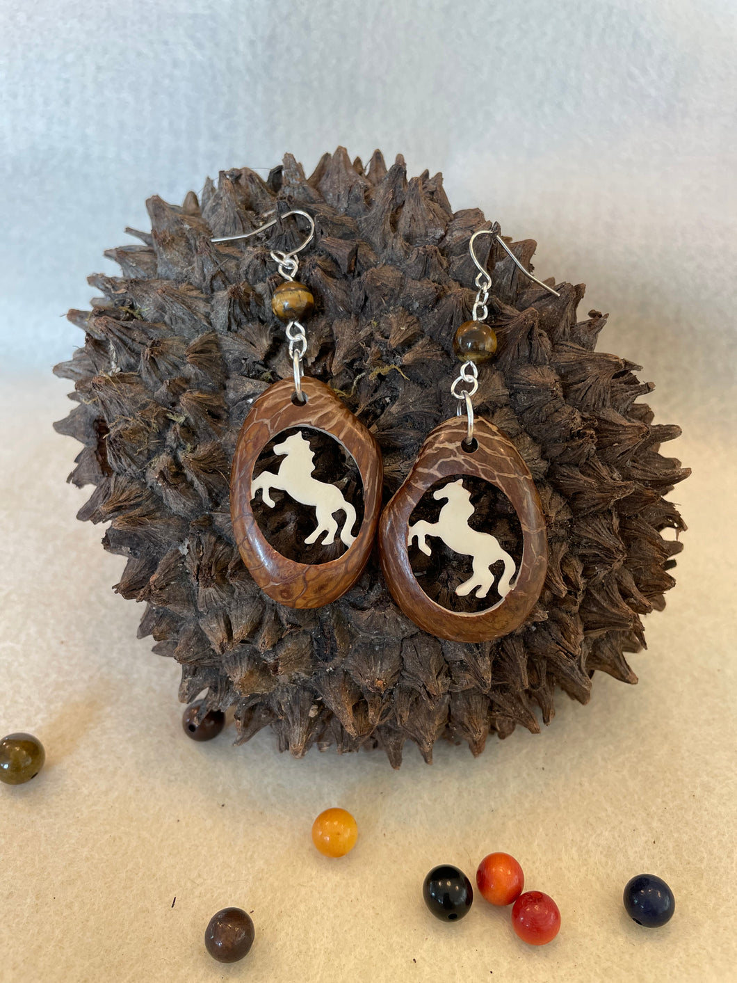 Carved Horse Tagua Nut Derby Earrings