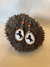 Load image into Gallery viewer, Carved Horse Tagua Nut Derby Earrings
