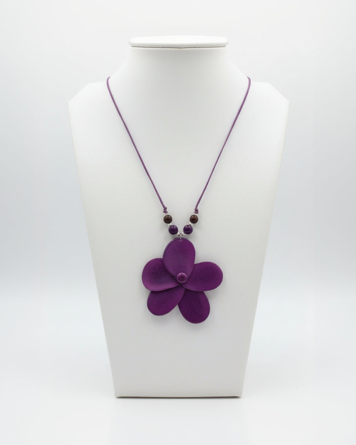 purple tagua nut rose-shaped pendant on an adjustable necklace winter
