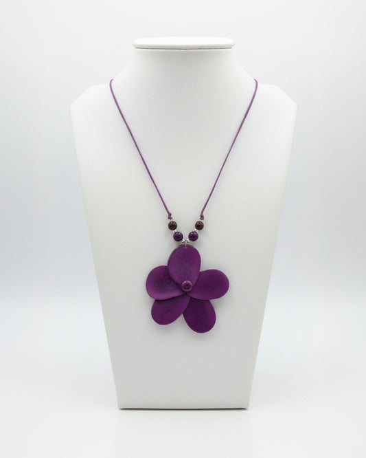 purple tagua nut rose-shaped pendant on an adjustable necklace winter