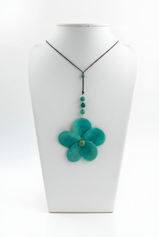 A teal green tagua nut rose-shaped adjustable necklace